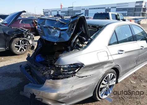 2015 Mercedes-Benz E 350 из США, поврежденный, VIN WDDHF5KB0FB129033